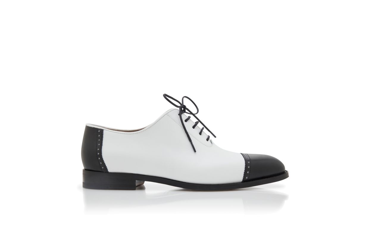 Zapatos de cuero de becerro negro y blanco con cordones