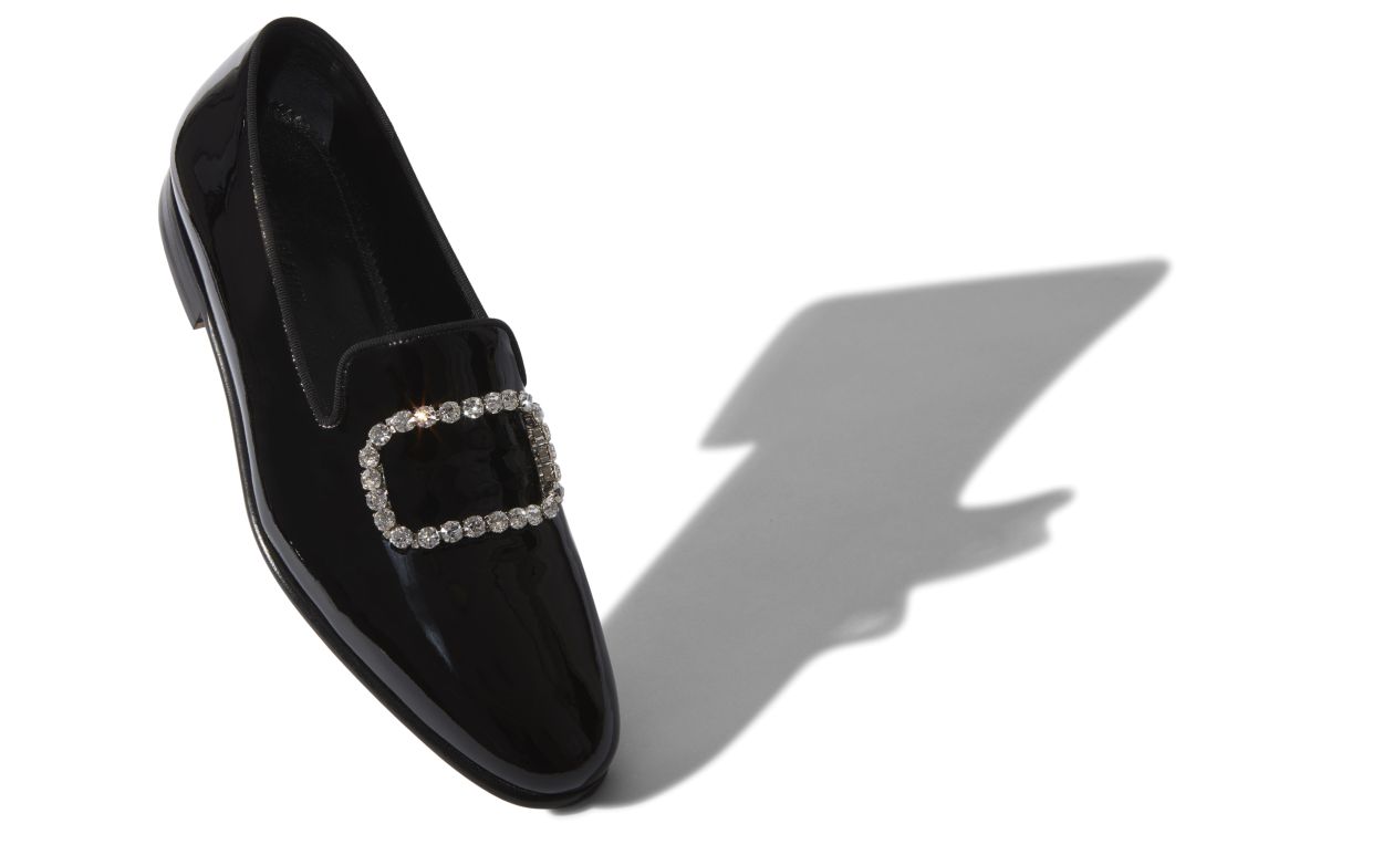 Zapatillas de cuero brillante negro con hebilla de joyería