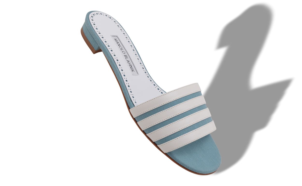 Mules planas de lino azul claro y blanco