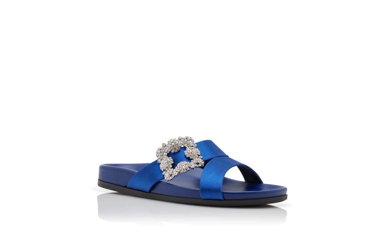 Mules planas con hebilla de joya de satín azul